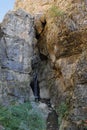 Source kiss under stones in the Tien Shan