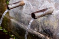 Source of two pipes with crystal clear water Royalty Free Stock Photo