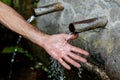 Source of two pipes with crystal clear water Royalty Free Stock Photo