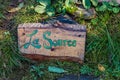 The source wooden earth festival sign