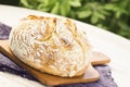 Sourdough Boule or Loaf of Bread on Cutting Board Royalty Free Stock Photo