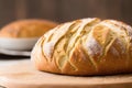 sourdough bread with crispy crust on wooden shelf bakery products Royalty Free Stock Photo