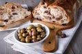 Sourdough bread with taggiasca olives. Royalty Free Stock Photo