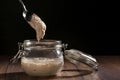 Sourdough starter in glass jar Royalty Free Stock Photo