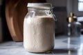 sourdough starter in jar, ready for its next cycle of baking and fermentation Royalty Free Stock Photo