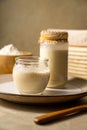 Sourdough starter in jars. Healthy wild fresh homemade yeast for sourdough bread baking. Royalty Free Stock Photo