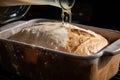 sourdough starter, with a rich and tangy flavor, being baked into loaf of crusty bread