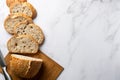 Sourdough Wheat Bread sliced on a wooden cutting board with a knife. Healthy natural bread made from organic products Royalty Free Stock Photo