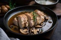 sous-vide chicken cooked in flavorful broth with mushrooms and herbs