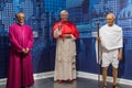 Archbishop Desmond Tutu, Pope Benedict XVI and Mahatma Gandhi wax statues at Madame Tussaud wax museum in London, United Kingdom