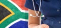 South Africa flag female doctor with stethoscope