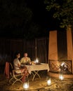 South Africa Kwazulu natal, luxury safari lodge in the bush , couple dinner at night Royalty Free Stock Photo