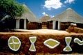 South Africa: Ndebele village with traditional colourfull Kraals Royalty Free Stock Photo