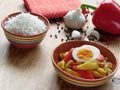 South African curry with vegetables, fruit and eggs