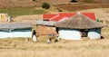 South african family near a traditional mud house in a small village, South Africa, apartheid, KwaZulu Natal