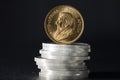 South African Gold Coin Krugurand on Silver Coins Royalty Free Stock Photo