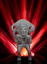 South-American clay Deity. Red neon rays in the background.