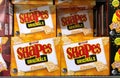 Packets of Arnotts Shapes on supermarket shelf