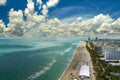 South Beach sandy surface with tourists relaxing on hot Florida sun. Tourism infrastructure in southern USA. Miami Beach Royalty Free Stock Photo