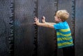 A young boy learns about the wall that heals Royalty Free Stock Photo