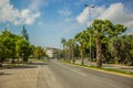 South country vivid landmark street view with car road and palms near tropic Mediterranean sea in hot summer colorful bright