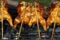 South East Asian Food. Grilled chicken. Grilled BBQ Chicken. Barbecued chicken on charcoal stove