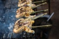South East Asian Food. Grilled chicken. Grilled BBQ Chicken. Barbecued chicken on charcoal stove