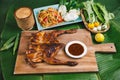 South East and East Asia: Typical Asian Food, Grilled Chicken with papaya salad served on plate, Thai Northeast food style