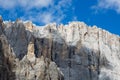 South face of Marmolada mountain, cloudy blue sky