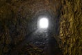 Way out a ancient stone tunnel light at the end of the tunnel Royalty Free Stock Photo