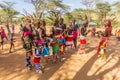 SOUTH HORR, KENYA - FEBRUARY 12, 2020: Group of Samburu tribe young men dancing wearing colorful headpieces made of