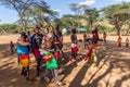 SOUTH HORR, KENYA - FEBRUARY 12, 2020: Group of Samburu tribe young men and women dancing wearing colorful headpieces