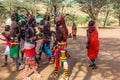 SOUTH HORR, KENYA - FEBRUARY 12, 2020: Group of Samburu tribe young men and women dancing wearing colorful headpieces