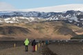 South Iceland Tourist walking to famous landmark the abandoned wreck of a US military plane on Solheimasandur