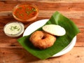 South indian breakfast combination of Medu vada and Idli or idly is a traditional and popular Food served with bowls of chutney Royalty Free Stock Photo