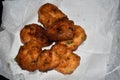 south indian cuisine- very oily Medu vadai or Vada kept on kitchen tissue. Very popular south Indian snack. Selective focus Royalty Free Stock Photo