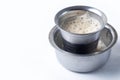 South Indian Filter coffee served on a white background. Closeup Royalty Free Stock Photo
