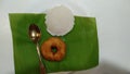 South Indian Food dish. Idli Menduwaga on banana leaf Royalty Free Stock Photo