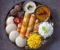 South Indian gluten free vegetarian platter in steel plate