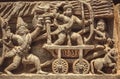 South Indian temple relief with battle scene. warriors with bow and arrows from 12th century, Halebidu, India