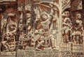 South Indian temple relief with hero Arjuna with bow and arrows in hands. Hindu structure 12th century, Halebidu, India