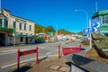 SOUTH ISLAND, NEW ZEALAND- MAY 23, 2017: Unidentified people walking in the street in main South Road, Greymouth, New