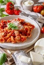 South italian  pasta orecchiette with tomato sauce and cacioricotta cheese Royalty Free Stock Photo