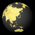 South Korea on dark globe with yellow world map. Royalty Free Stock Photo