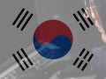 South Korea flag and Anonymous hooded hacker