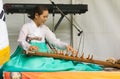 South Korean female musician playing stringed instrument