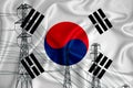 South Korean flag in the background Conceptual illustration and silhouette of a high voltage power line in the foreground a symbol