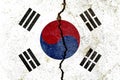 South Korean flag on a cracked wall-politics, war, conflict concept