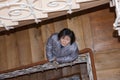 South Korean woman looks up from an old character staircase
