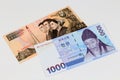 South Korean 1000 Won banknote with old korean banknotes
